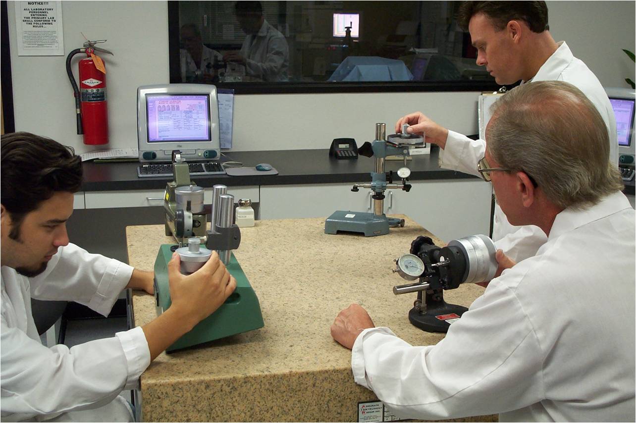 A.I.R. technicians calibrating dimensional gauges